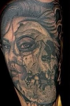 Skull face cover-up forearm tattoo by Clayton