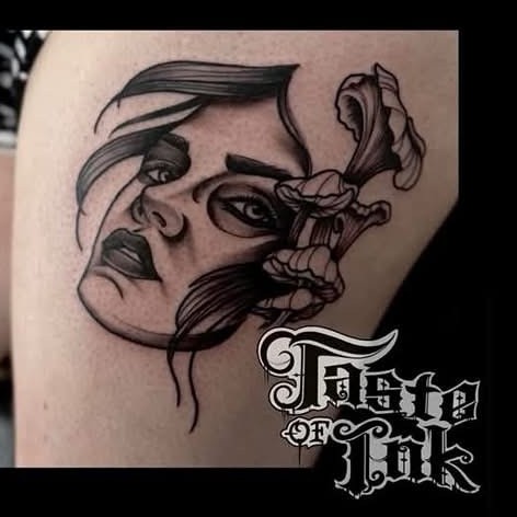 Fine line woman's face and flower shoulder tattoo by Clayton